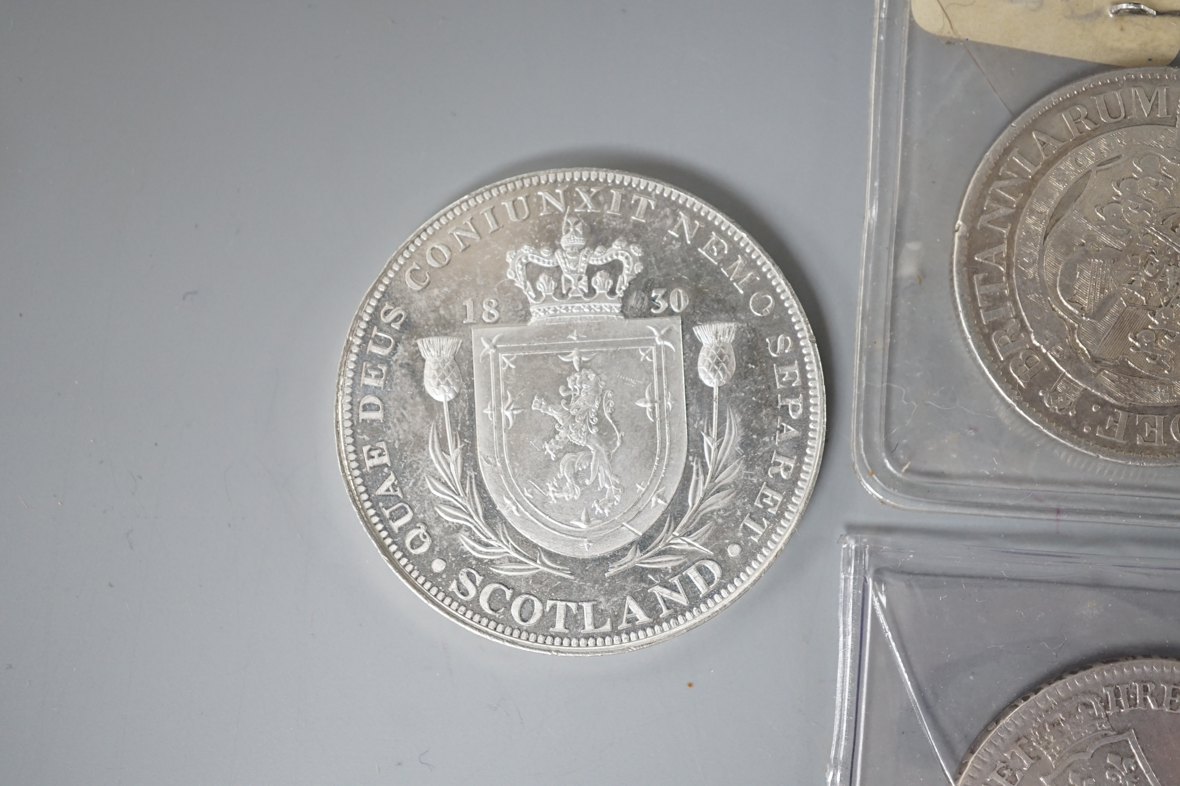 Three Georgian half crowns; 1746, 1818 & 1823 and two other coins.